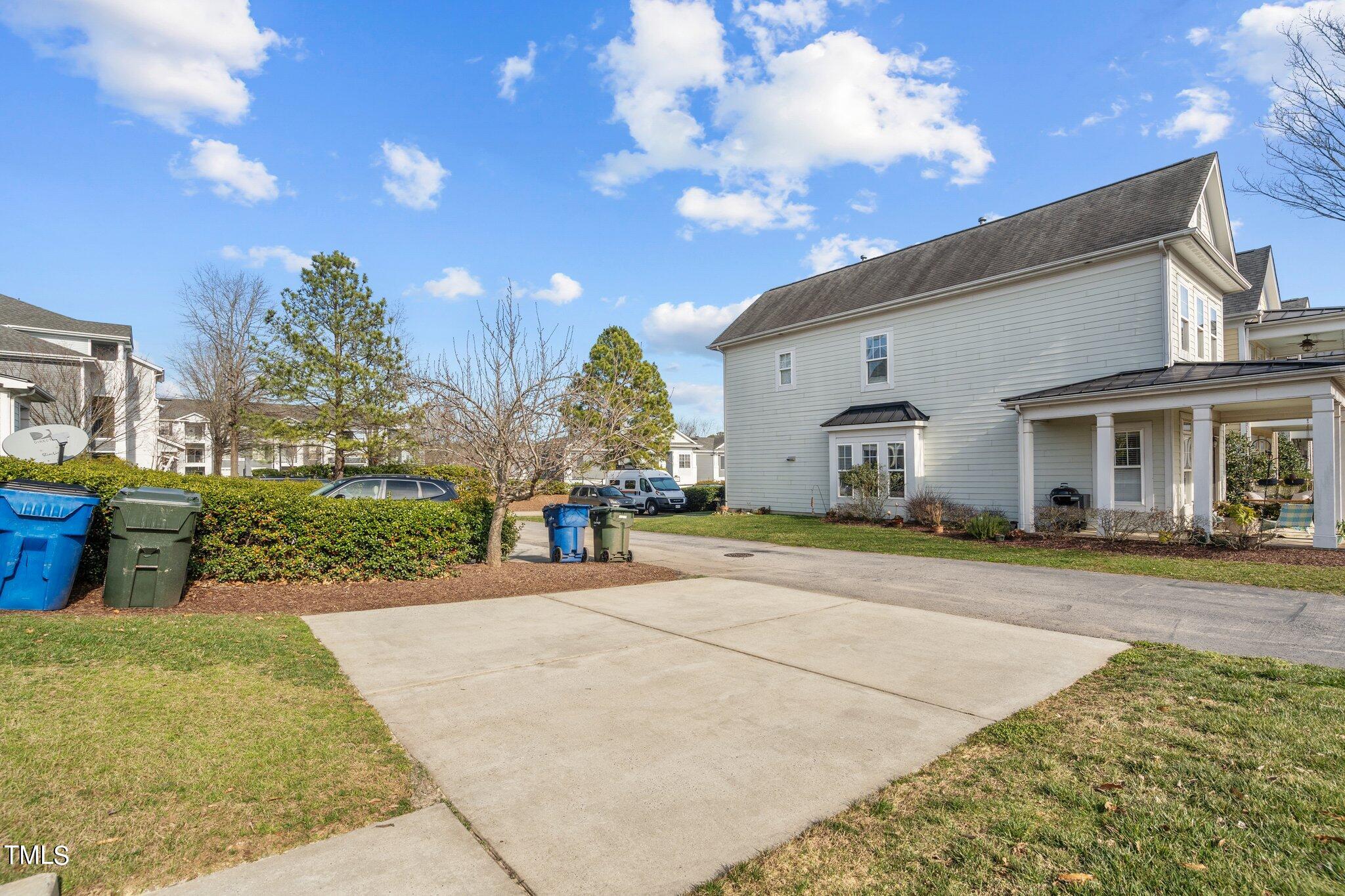 7765 Courtney Estates Drive Raleigh, NC 27617 - Photo 29 of 37 a view of a house with entertaining space