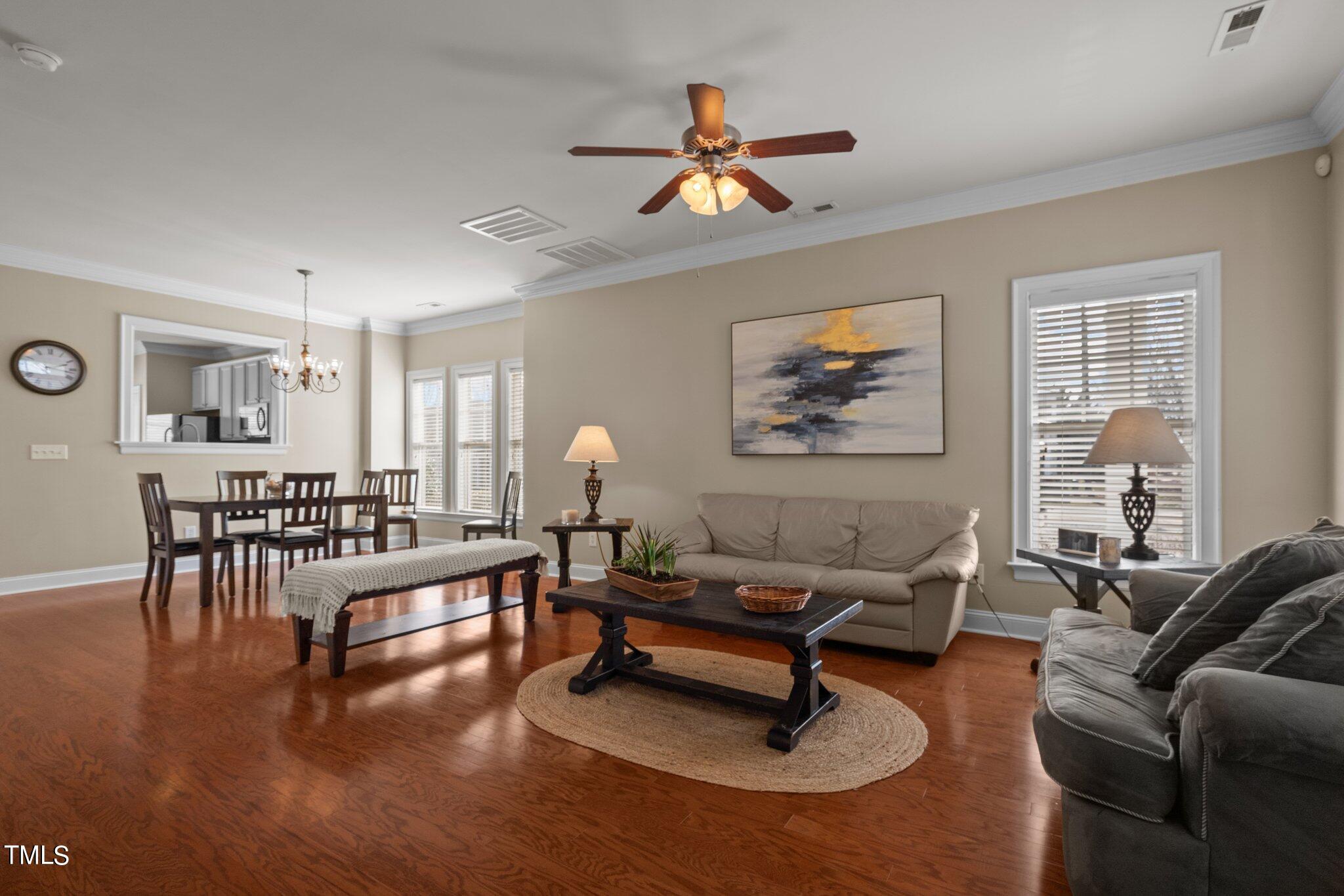 7765 Courtney Estates Drive Raleigh, NC 27617 - Photo 8 of 37 a living room with furniture