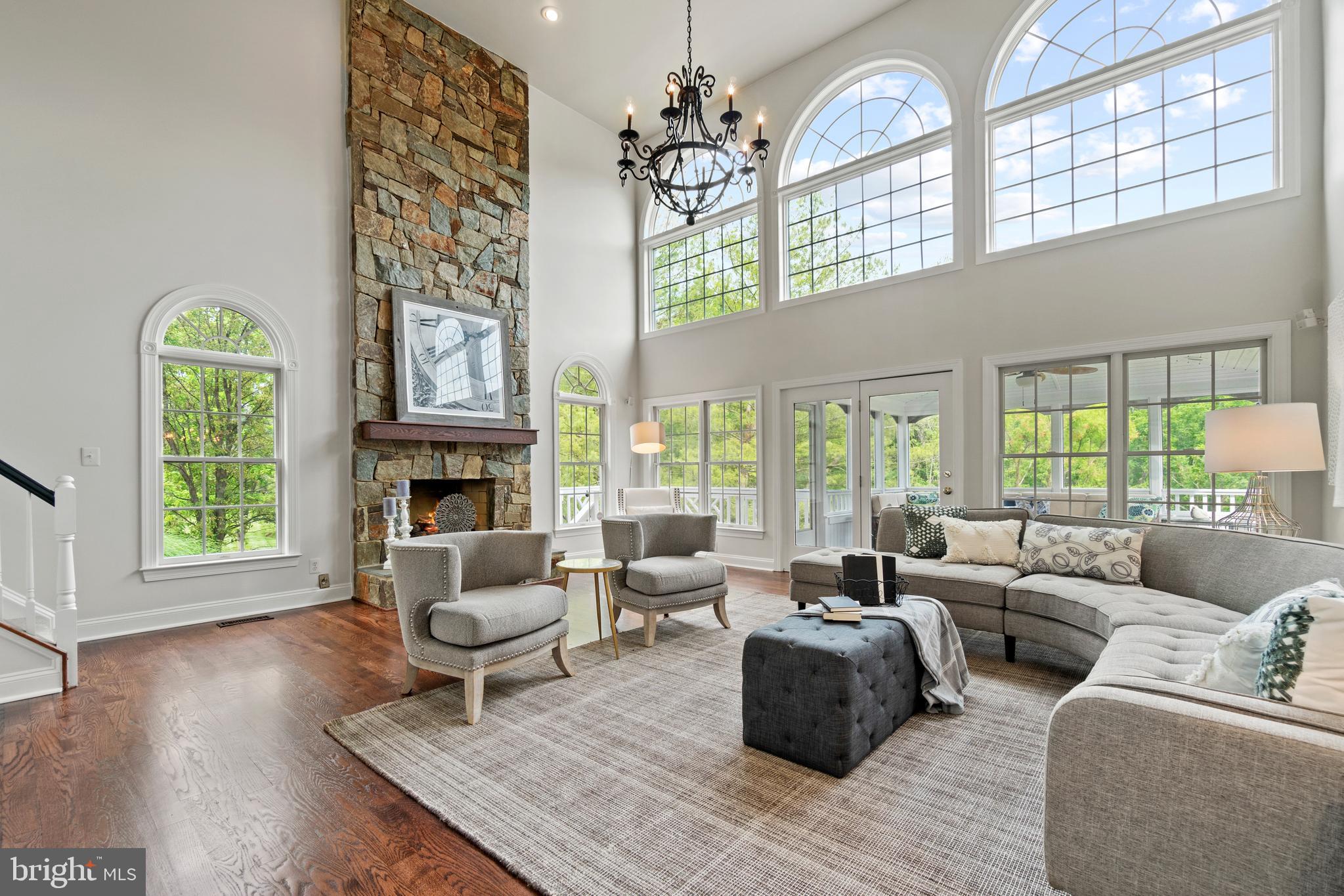 1719 Raleigh Hill Road Vienna, VA 22182 - Photo 14 of 57 2 story stone gas fireplace. loads of light!