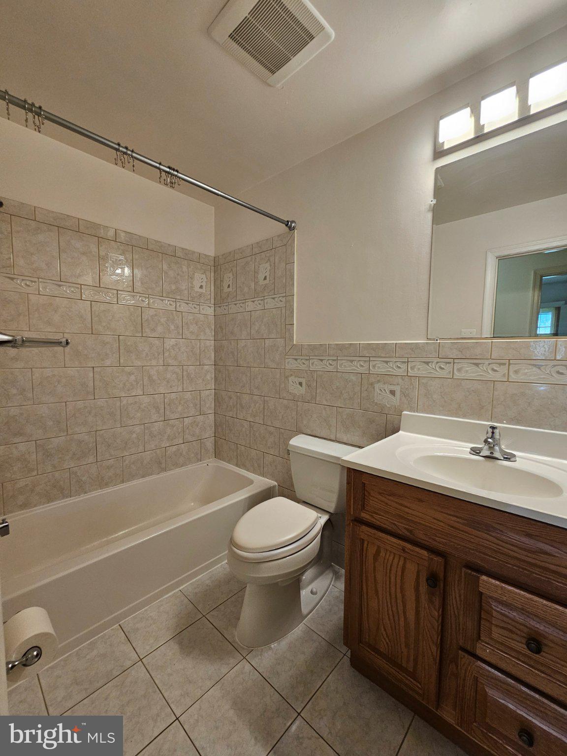 5683 Ravenel Lane Springfield, VA 22151 - Photo 8 of 17 Charming bathroom with classic tiles.