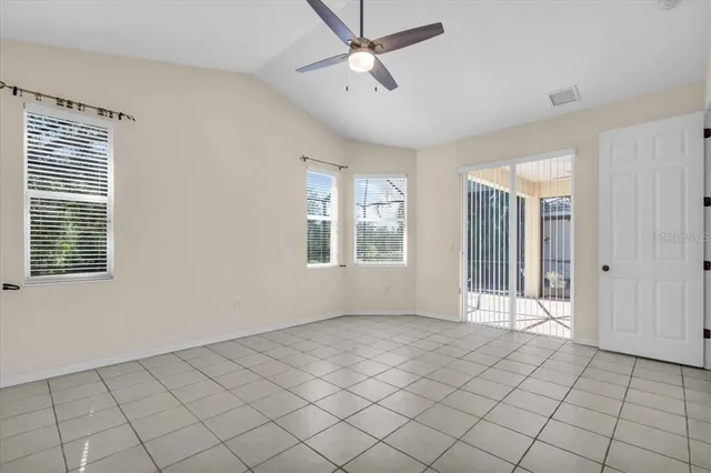 a bathroom with a double vanity sink mirror and shower