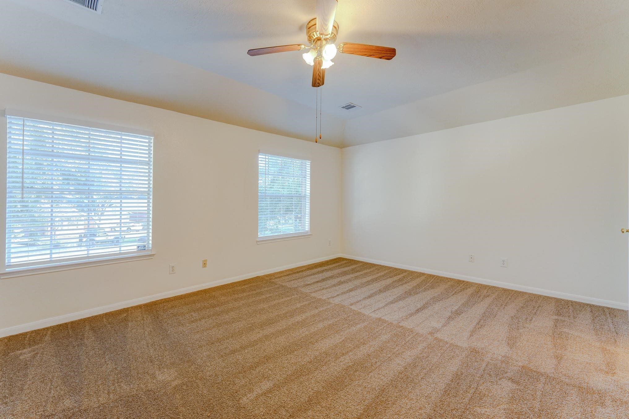 5123 Alderney Court Rosenberg, TX 77471 - Photo 5 of 9 a view of empty room with window