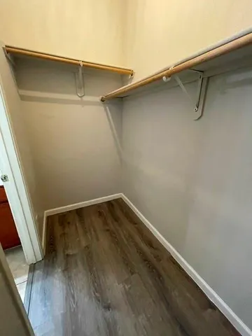 a view of small space with racks on the wall