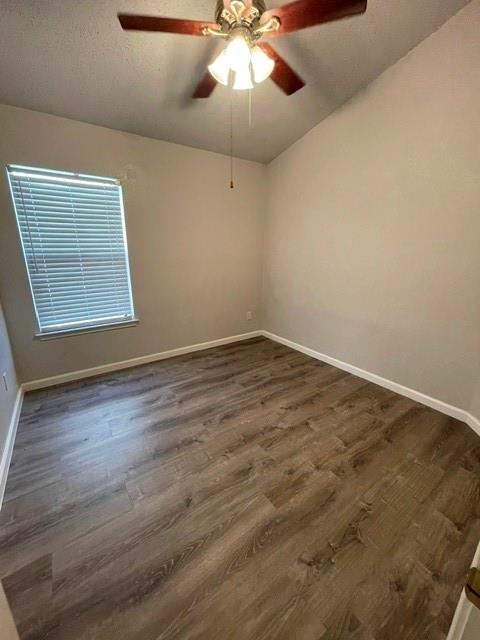 6800 Geyser Trail Watauga, TX 76137 - Photo 13 of 20 an empty room with wooden floor and windows