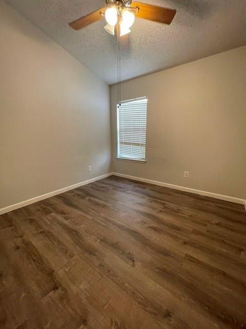 6800 Geyser Trail Watauga, TX 76137 - Photo 16 of 20 an empty room with a chandelier fan and wooden floor