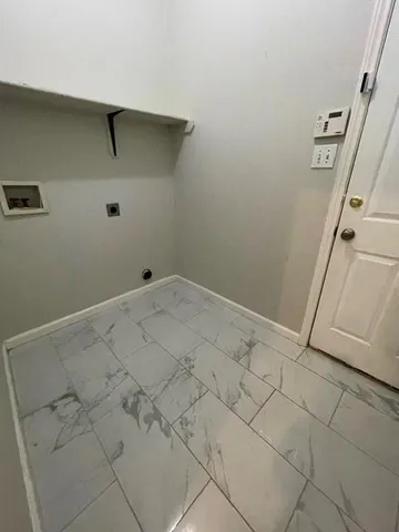 a view of a room with racks on the wall