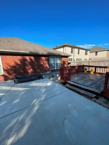 a view of a car park in front of a building