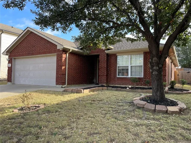 a front view of house with yard