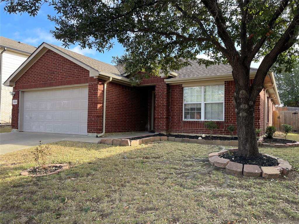 6800 Geyser Trail Watauga, TX 76137 - Photo 2 of 20 a front view of house with yard