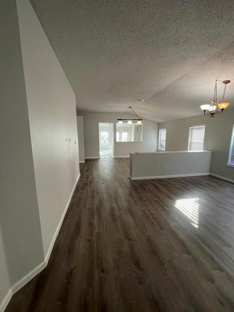 6800 Geyser Trail Watauga, TX 76137 - Photo 3 of 20 an empty room with wooden floor and windows