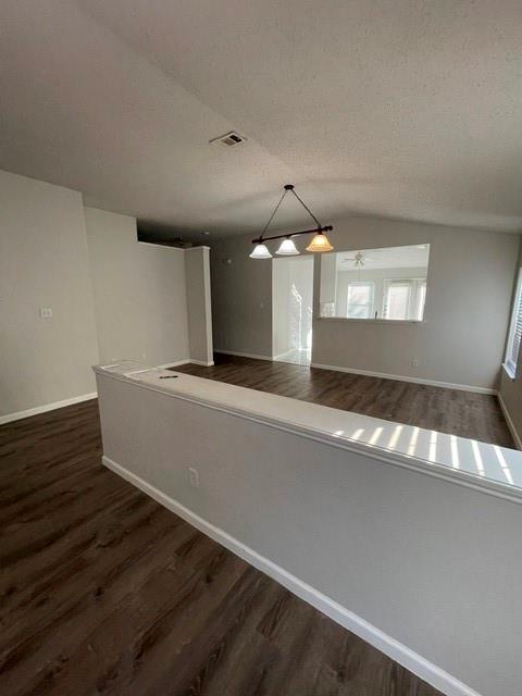 6800 Geyser Trail Watauga, TX 76137 - Photo 4 of 20 an empty room with wooden floor and windows