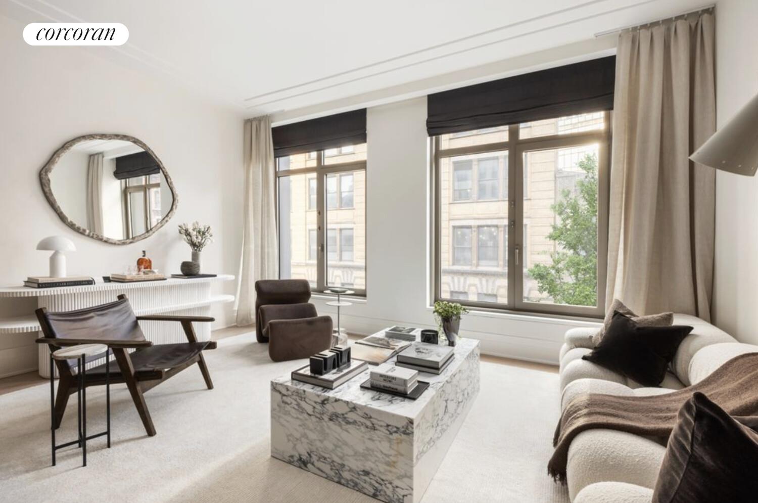 40 Bleecker Street, Unit 4A Manhattan, NY 10012 - Photo 3 of 16 a living room with furniture and a large window