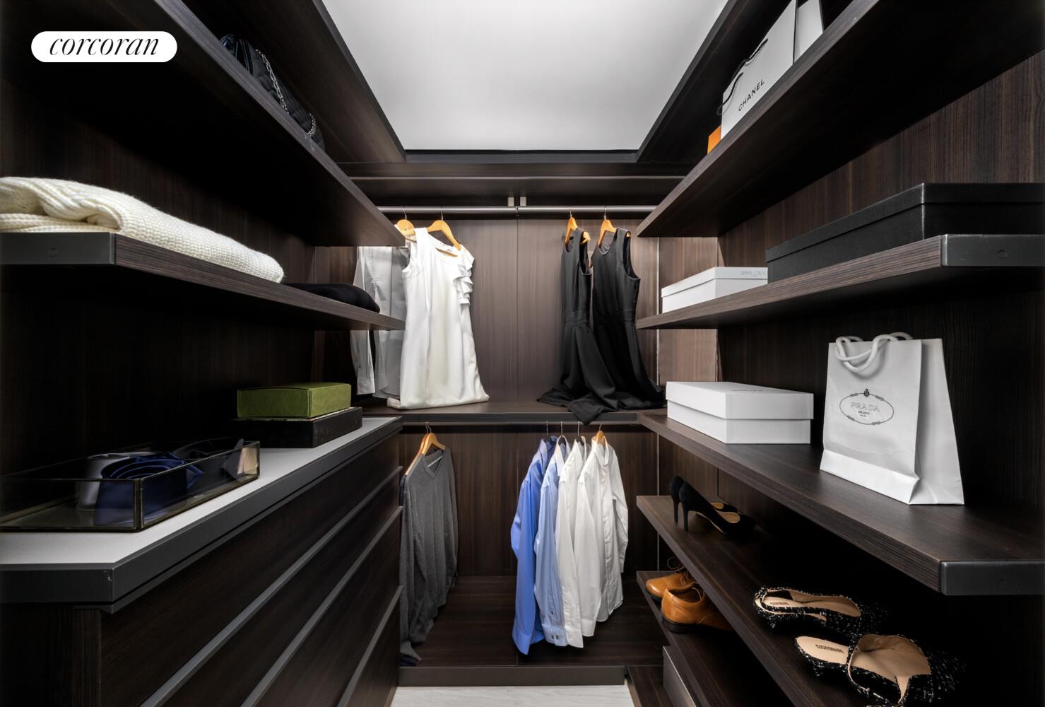 40 Bleecker Street, Unit 4A Manhattan, NY 10012 - Photo 8 of 16 a view of walk in closet with clothes and shoes