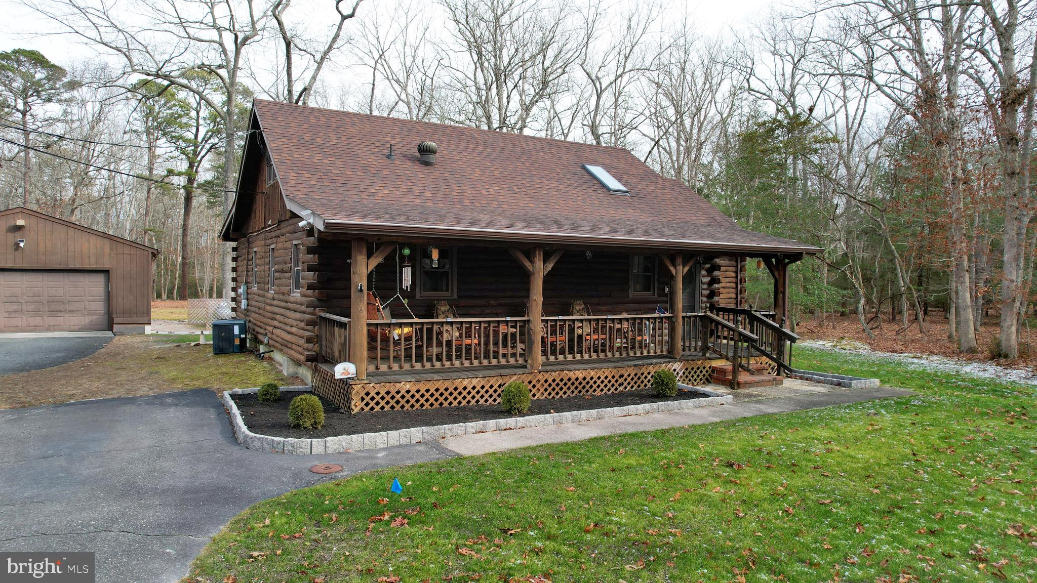 853 Clarks Landing Road Egg Harbor City, NJ 08215 - Photo 1 of 62 a view of a house with a yard and sitting area