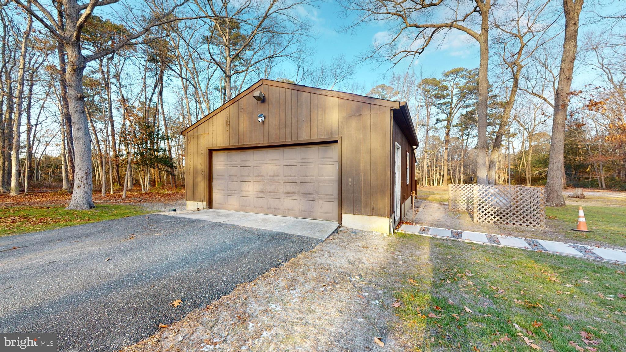 853 Clarks Landing Road Egg Harbor City, NJ 08215 - Photo 19 of 62 a front view of a house with a yard