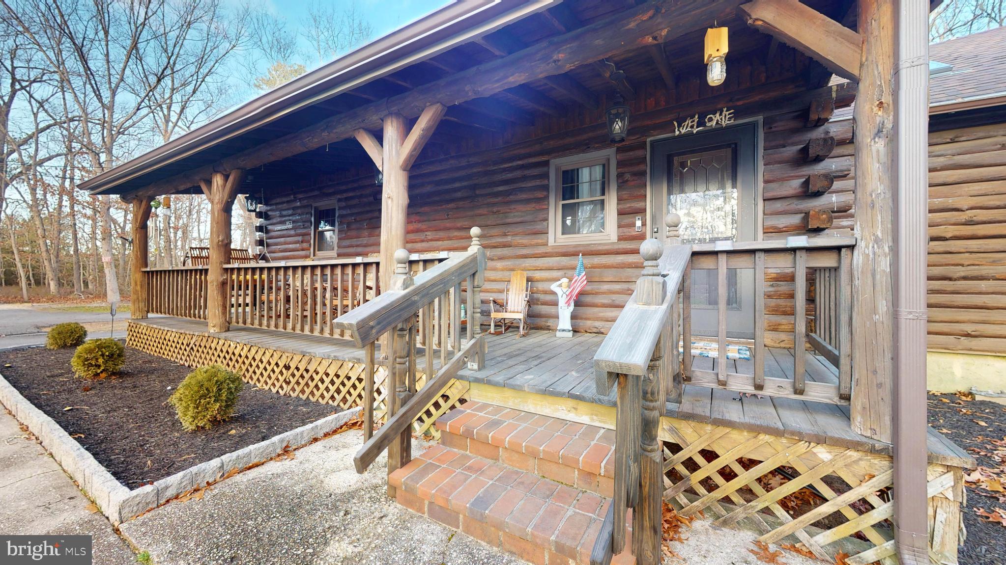 853 Clarks Landing Road Egg Harbor City, NJ 08215 - Photo 20 of 62 front view of a house with a small yard