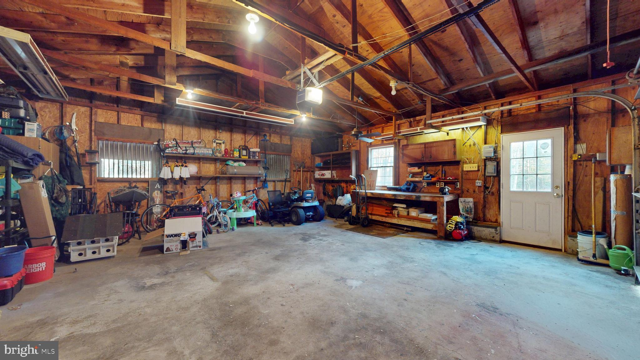 853 Clarks Landing Road Egg Harbor City, NJ 08215 - Photo 28 of 62 a view of a garage with parked cars