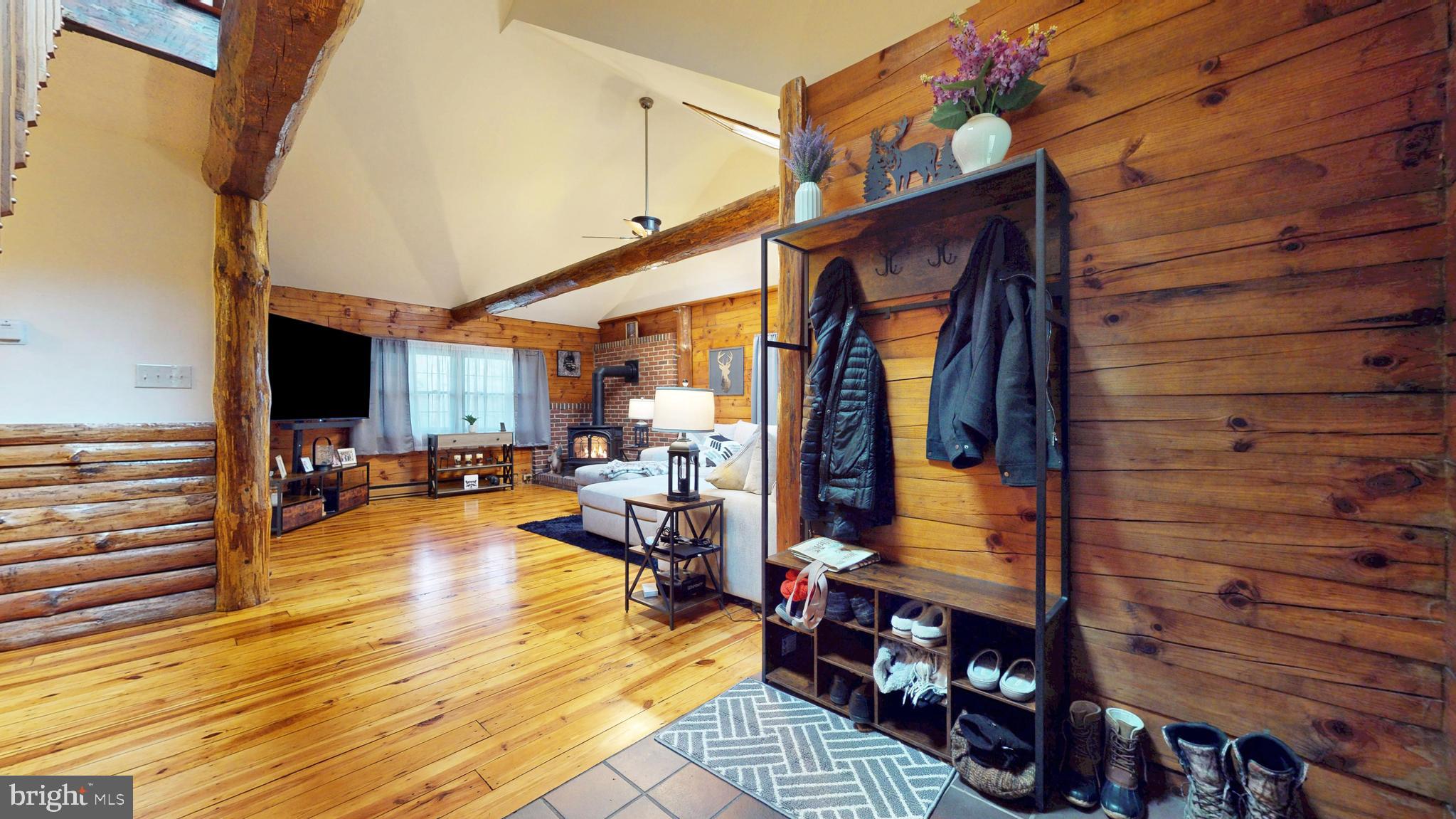 853 Clarks Landing Road Egg Harbor City, NJ 08215 - Photo 31 of 62 a view of living room filled with furniture and wooden floor