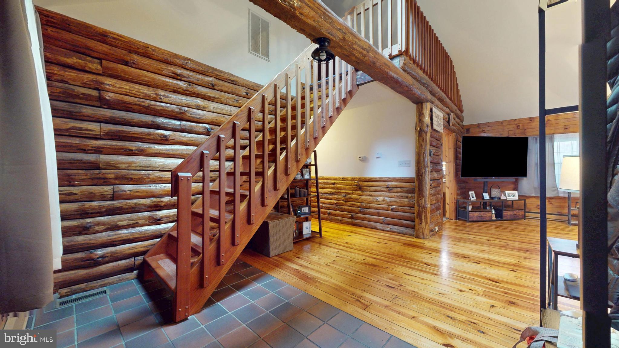 853 Clarks Landing Road Egg Harbor City, NJ 08215 - Photo 32 of 62 a view of entryway with wooden floor and stairs