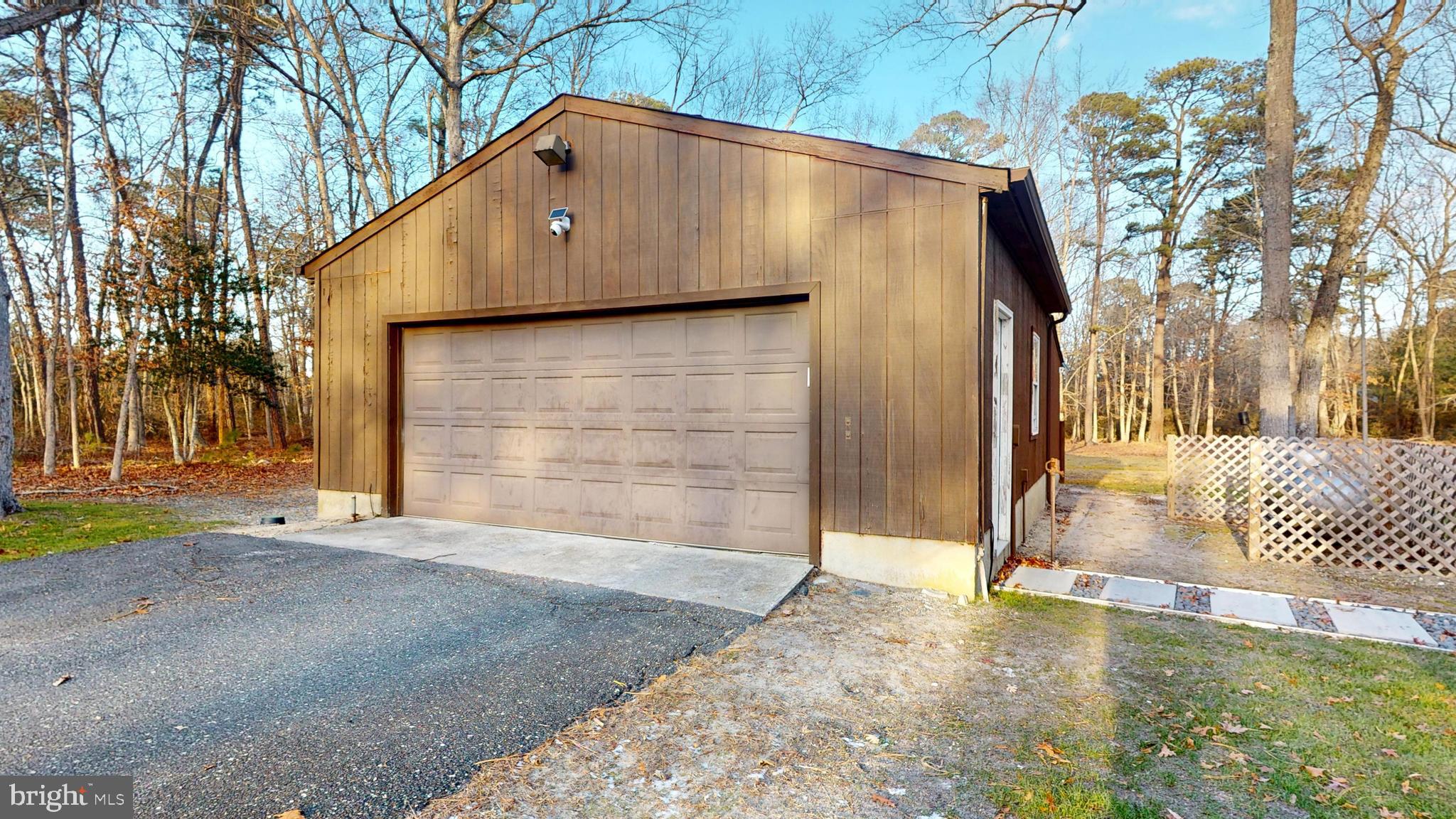 853 Clarks Landing Road Egg Harbor City, NJ 08215 - Photo 34 of 62 a front view of a house with a yard