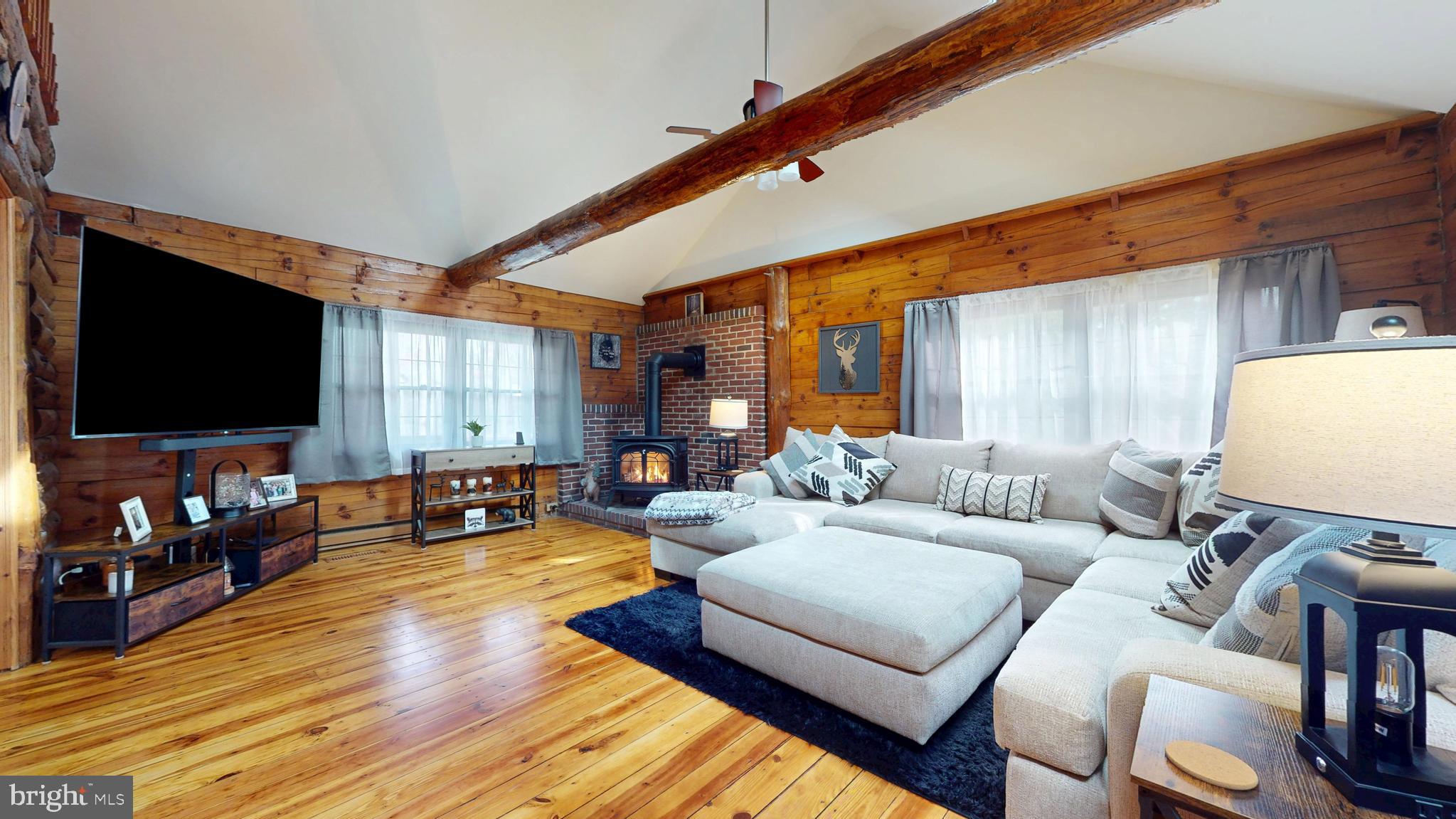 853 Clarks Landing Road Egg Harbor City, NJ 08215 - Photo 43 of 62 a living room with furniture and a flat screen tv