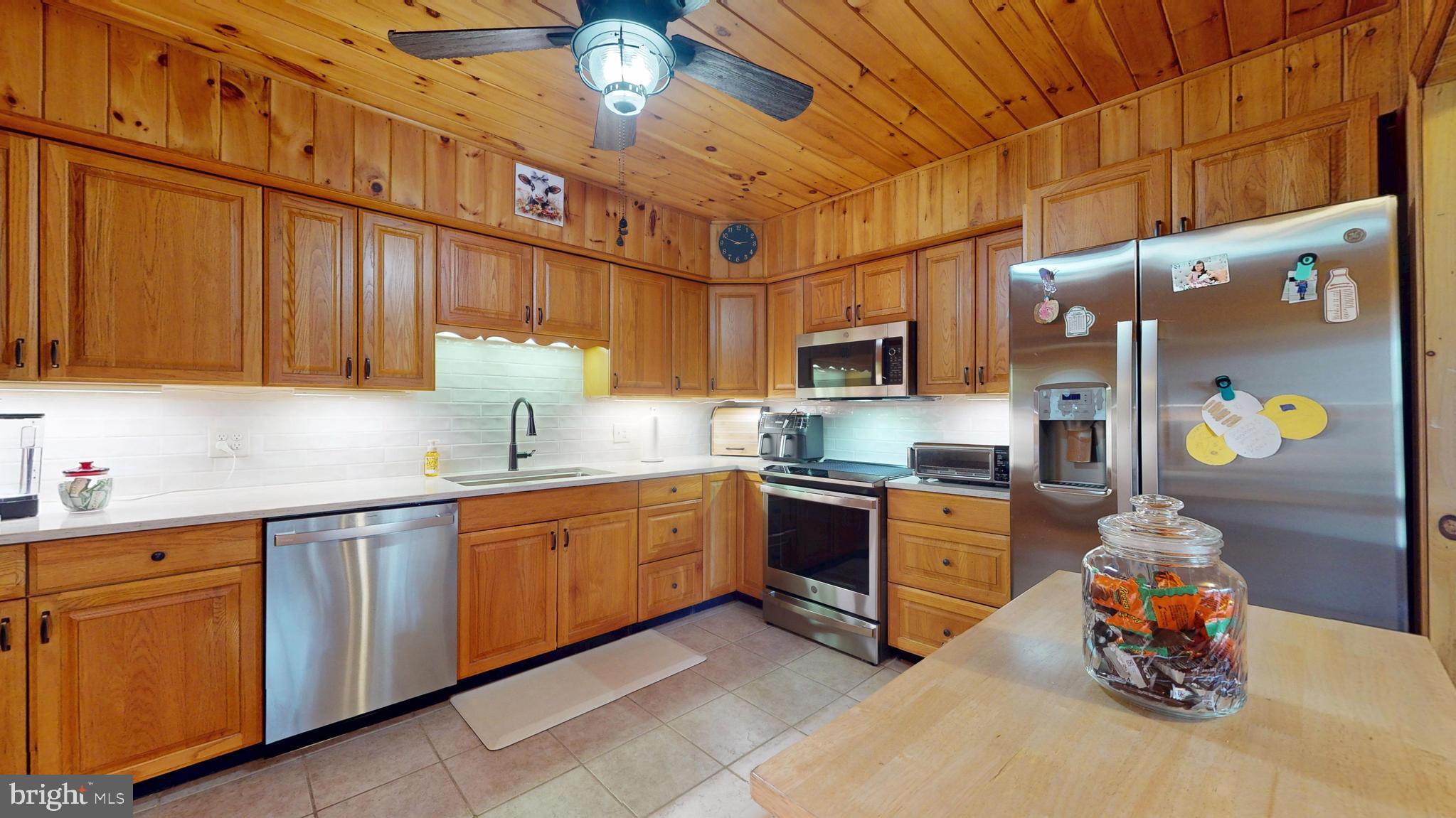 853 Clarks Landing Road Egg Harbor City, NJ 08215 - Photo 47 of 62 a kitchen with stainless steel appliances granite countertop a sink and cabinets