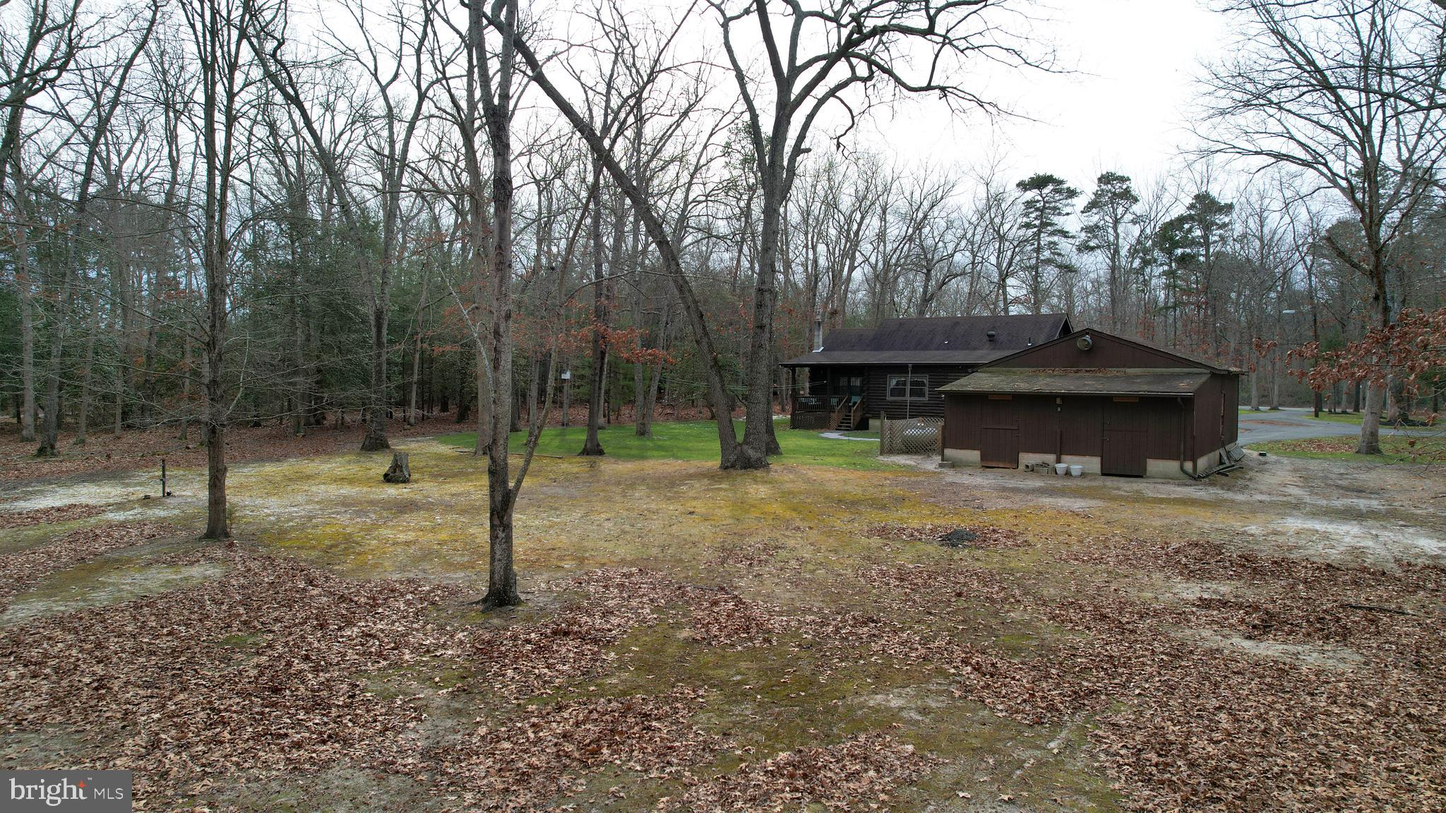 853 Clarks Landing Road Egg Harbor City, NJ 08215 - Photo 7 of 62 a view of a tiny house with a yard