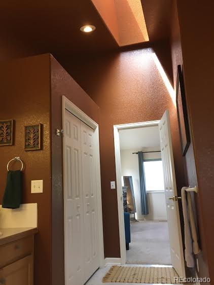 389 Rock Road Bailey, CO 80421 - Photo 17 of 35 a view of a hallway with a livingroom and furniture