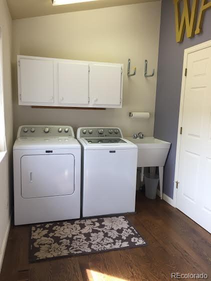 389 Rock Road Bailey, CO 80421 - Photo 32 of 35 a utility room with dryer and washer