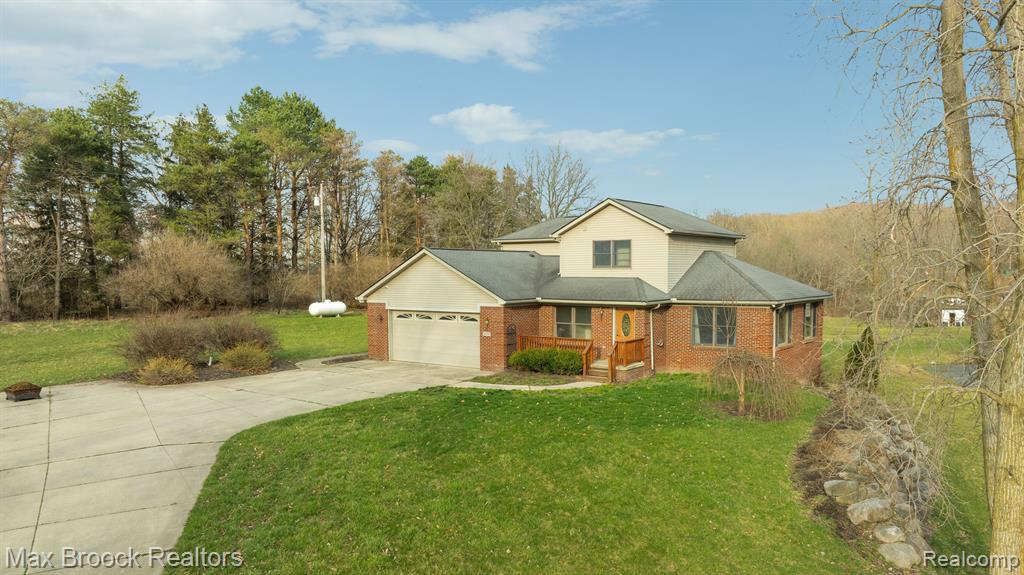 6426 Oak Grove Road Howell, MI 48855 - Photo 1 of 56