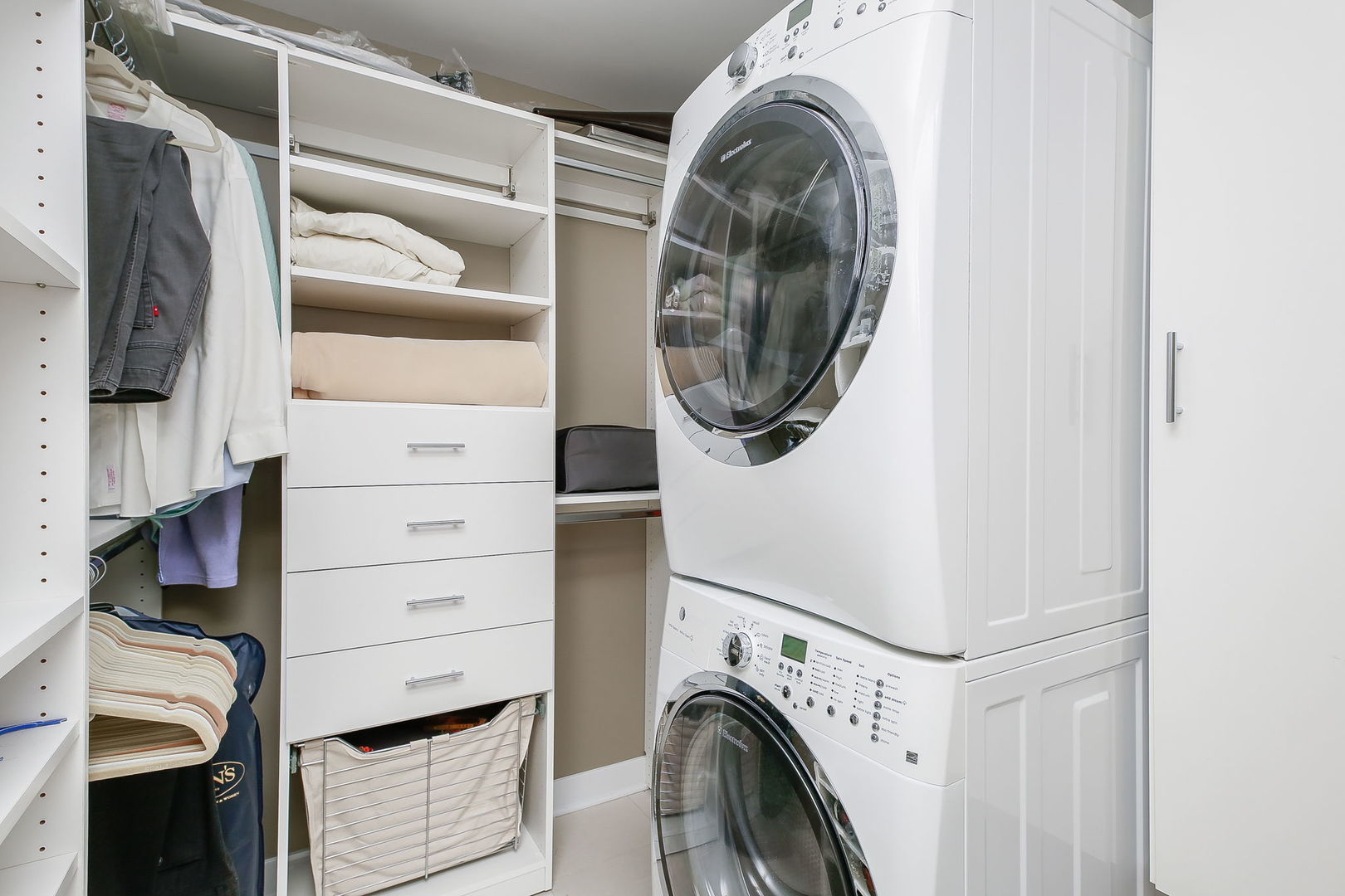 2 East Erie Street, Unit 2101 Chicago, IL 60611 - Photo 11 of 13 a view of walk in closet with clothes and shoes