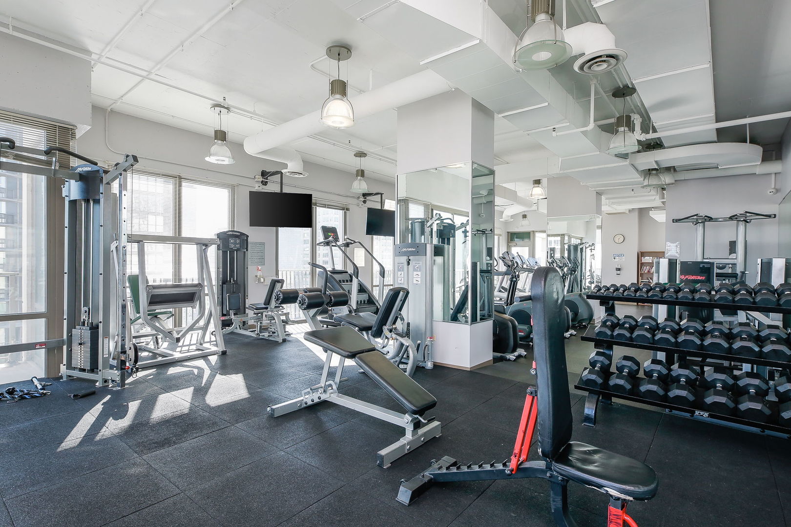 2 East Erie Street, Unit 2101 Chicago, IL 60611 - Photo 12 of 13 a view of a room with gym equipment