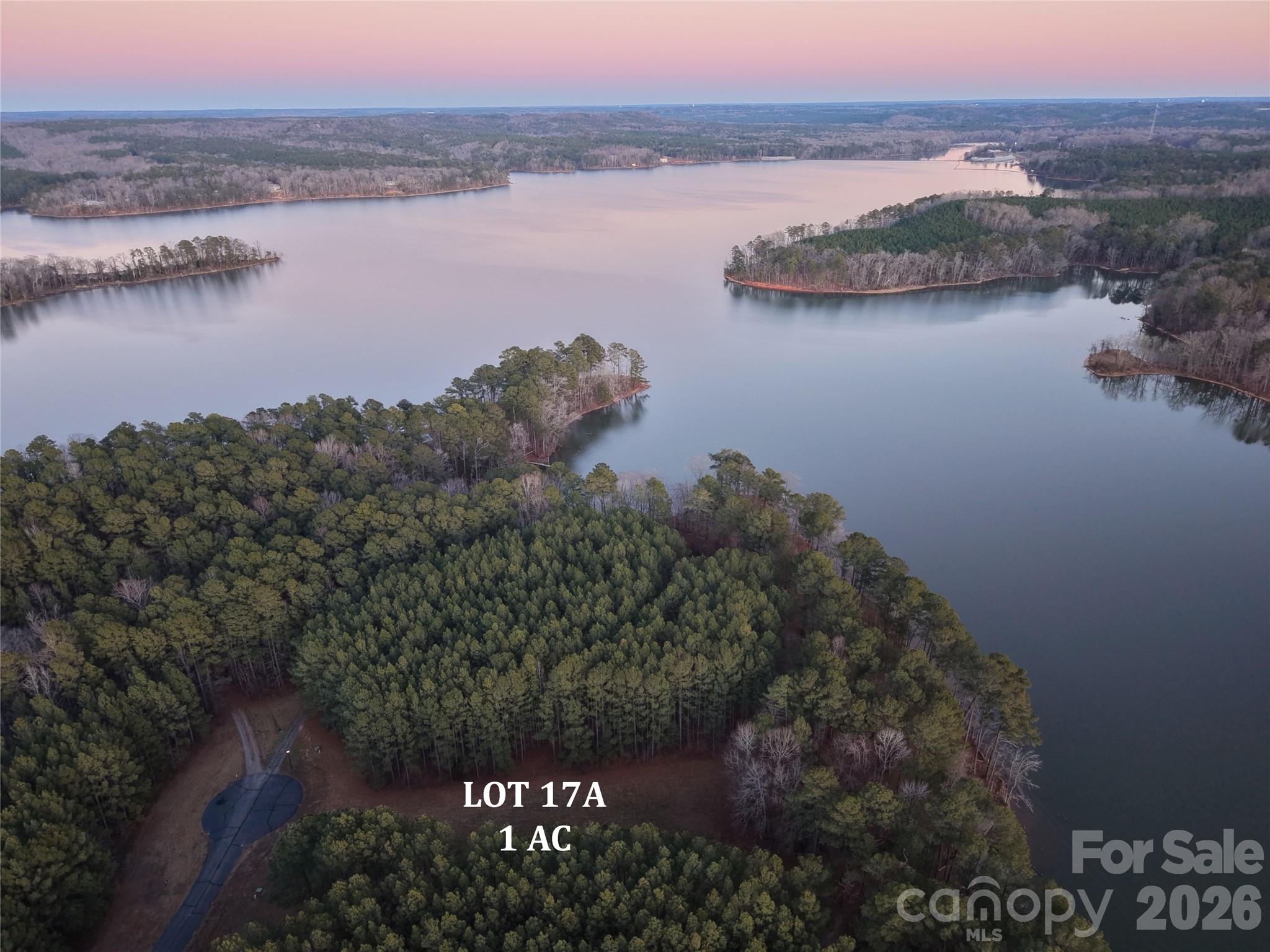 Tbd Tbd Spencer Pointe Road Lilesville, NC 28091 - Photo 14 of 19 a view of a lake from a city