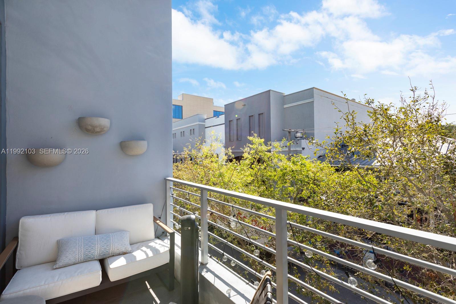 3339 Virginia Street, Unit 311 Miami, FL 33133 - Photo 6 of 16 a view of city from balcony