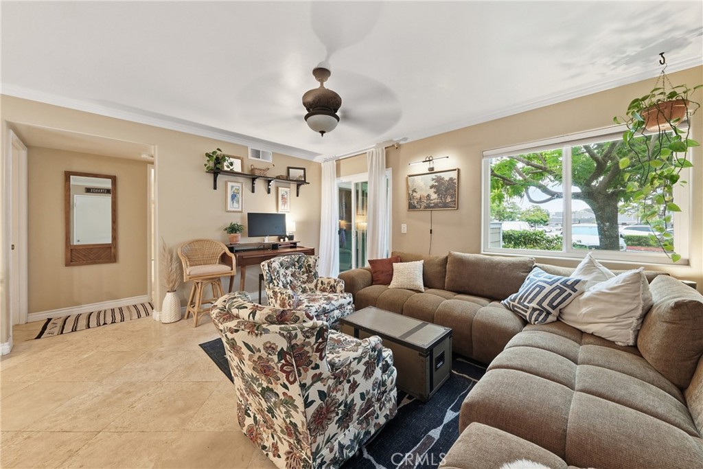 34032 Selva Road, Unit 96 Dana Point, CA 92629 - Photo 2 of 41 a living room with furniture and a large window