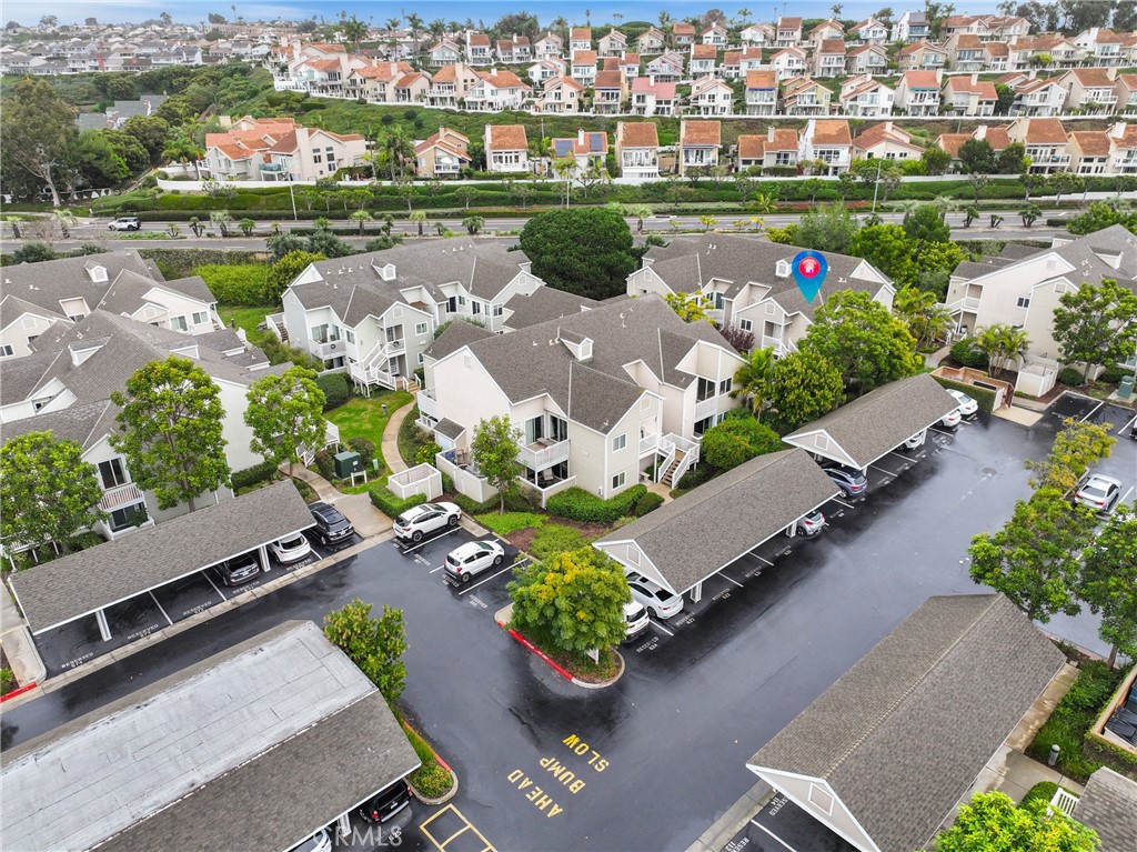 34032 Selva Road, Unit 96 Dana Point, CA 92629 - Photo 32 of 41 an aerial view of a house with a garden and lake view