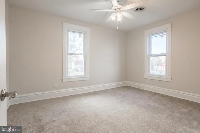 a bathroom with a toilet sink and shower