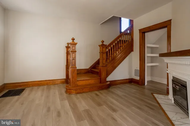 a view of entryway with wooden floor