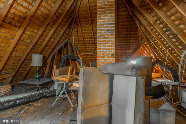 a view of an empty room with a balcony