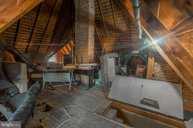 a view of an empty room with a balcony