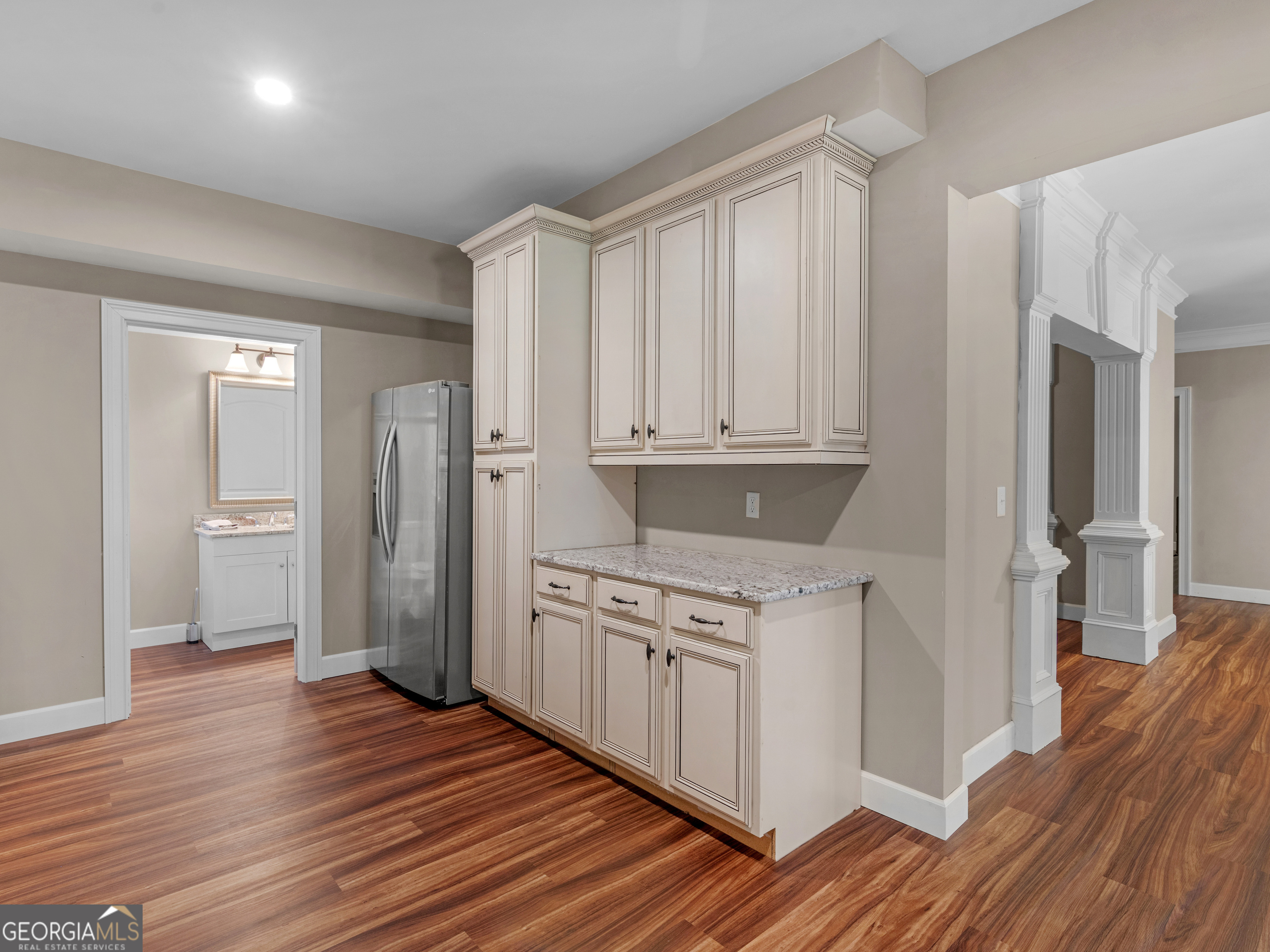 221 Hummingbird Court Hampton, GA 30228 - Photo 54 of 77 a kitchen with stainless steel appliances granite countertop a refrigerator and a stove top oven