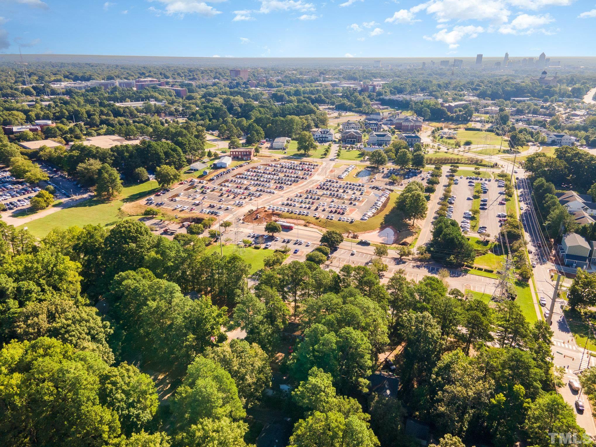 3710 Greenleaf Street Raleigh, NC 27606 - Photo 10 of 12 an aerial view of residential building with green space