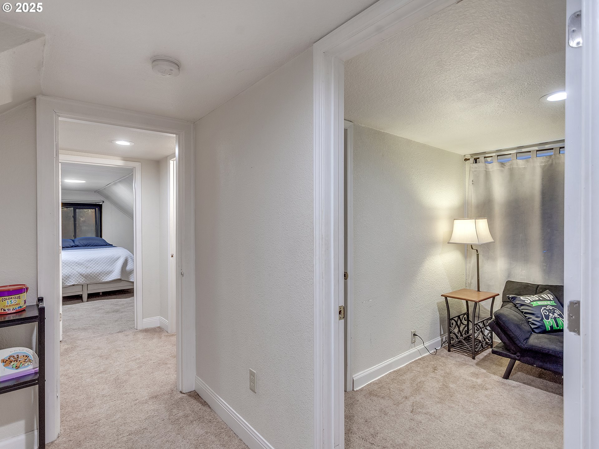 299 Southwest 3rd Avenue Canby, OR 97013 - Photo 18 of 32 a living room with furniture and a lamp