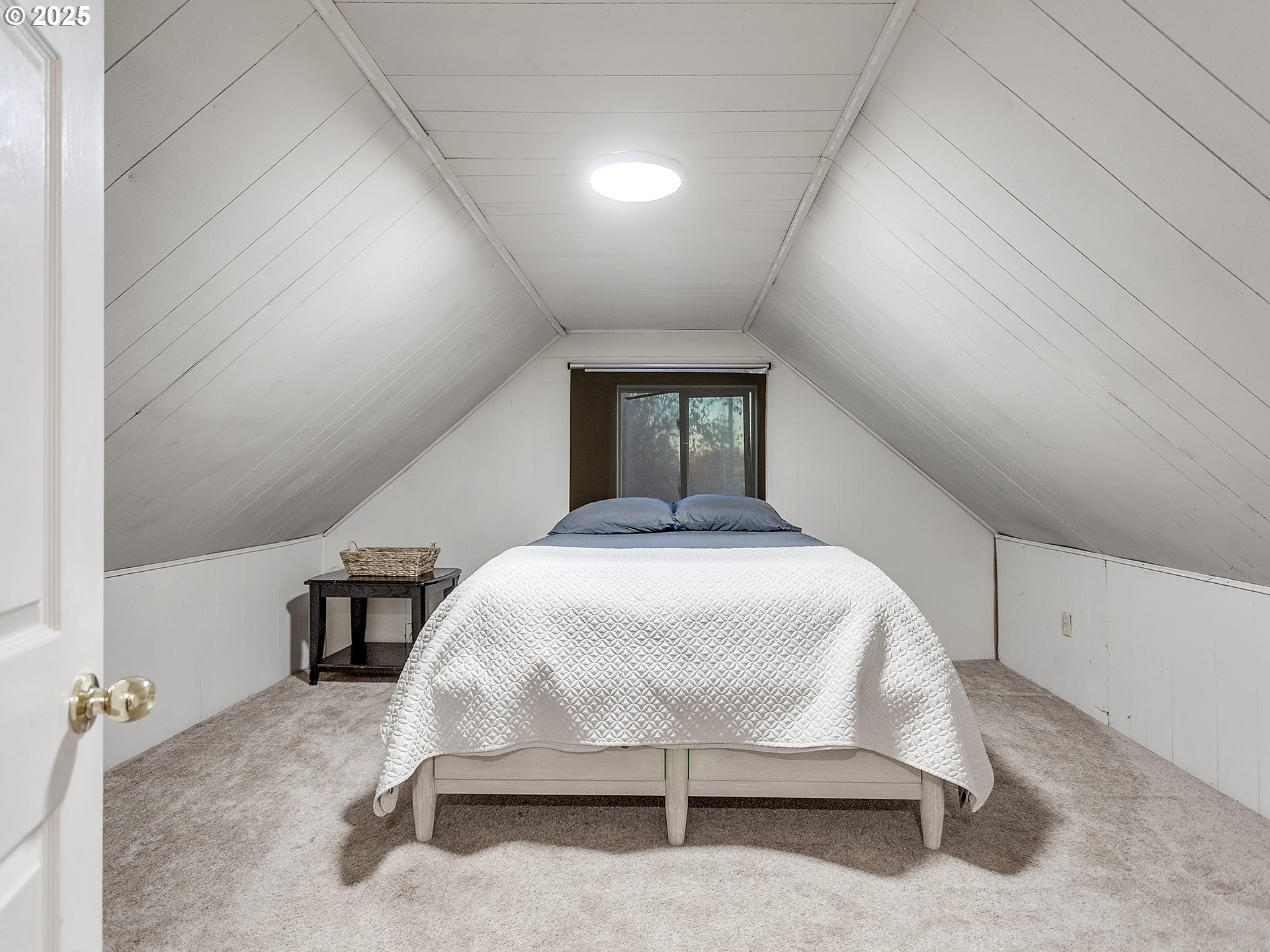 299 Southwest 3rd Avenue Canby, OR 97013 - Photo 21 of 32 a bedroom with a bed and lamp