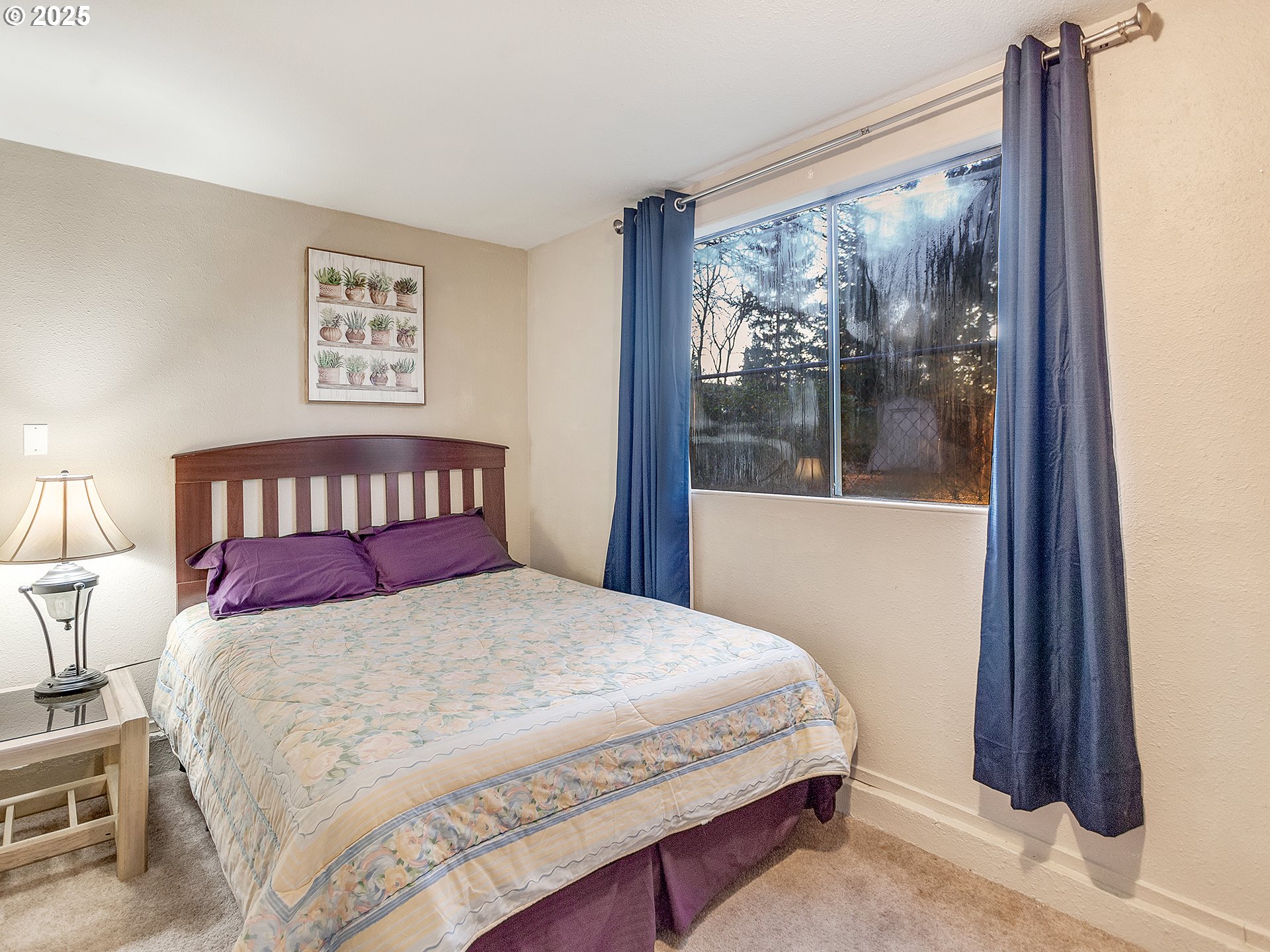 299 Southwest 3rd Avenue Canby, OR 97013 - Photo 25 of 32 a bedroom with a bed and glass window