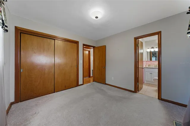 a bathroom with a toilet and a sink
