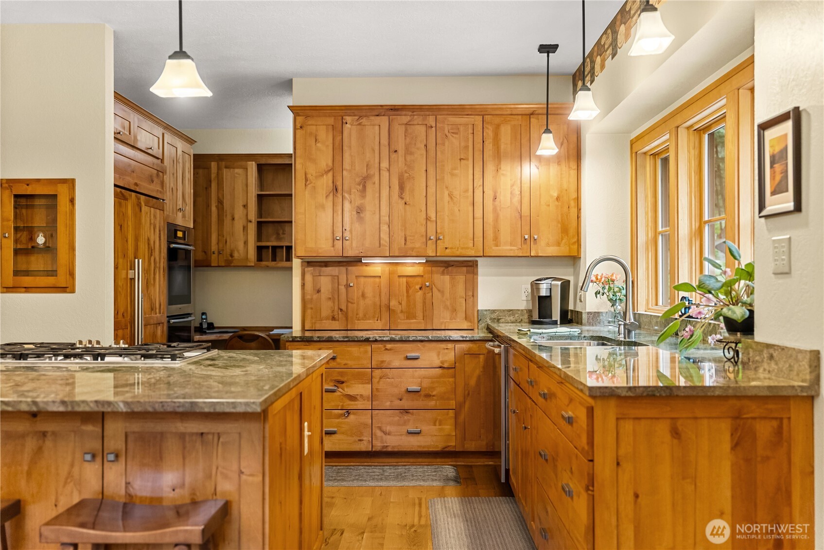 201 Libby Creek Road Carlton, WA 98814 - Photo 13 of 37 a kitchen with stainless steel appliances granite countertop a sink stove and cabinets