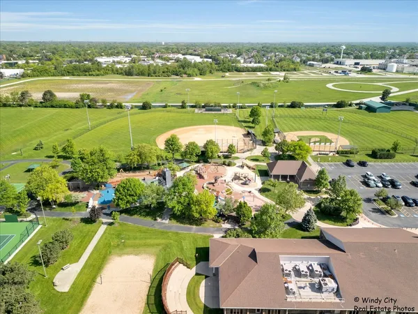 an aerial view of ocean with residential house with outdoor space and river
