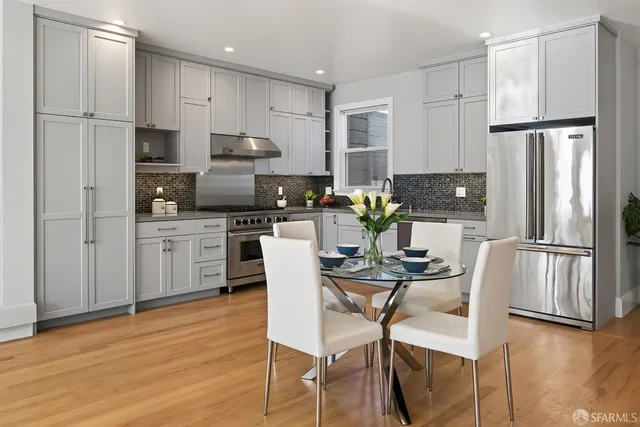 a bedroom with bed and a potted plant