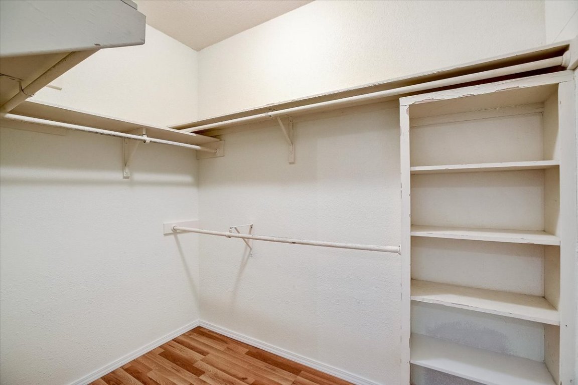 4711 Spicewood Springs Road, Unit 2112 Austin, TX 78759 - Photo 17 of 29 a view of an empty walk in closet